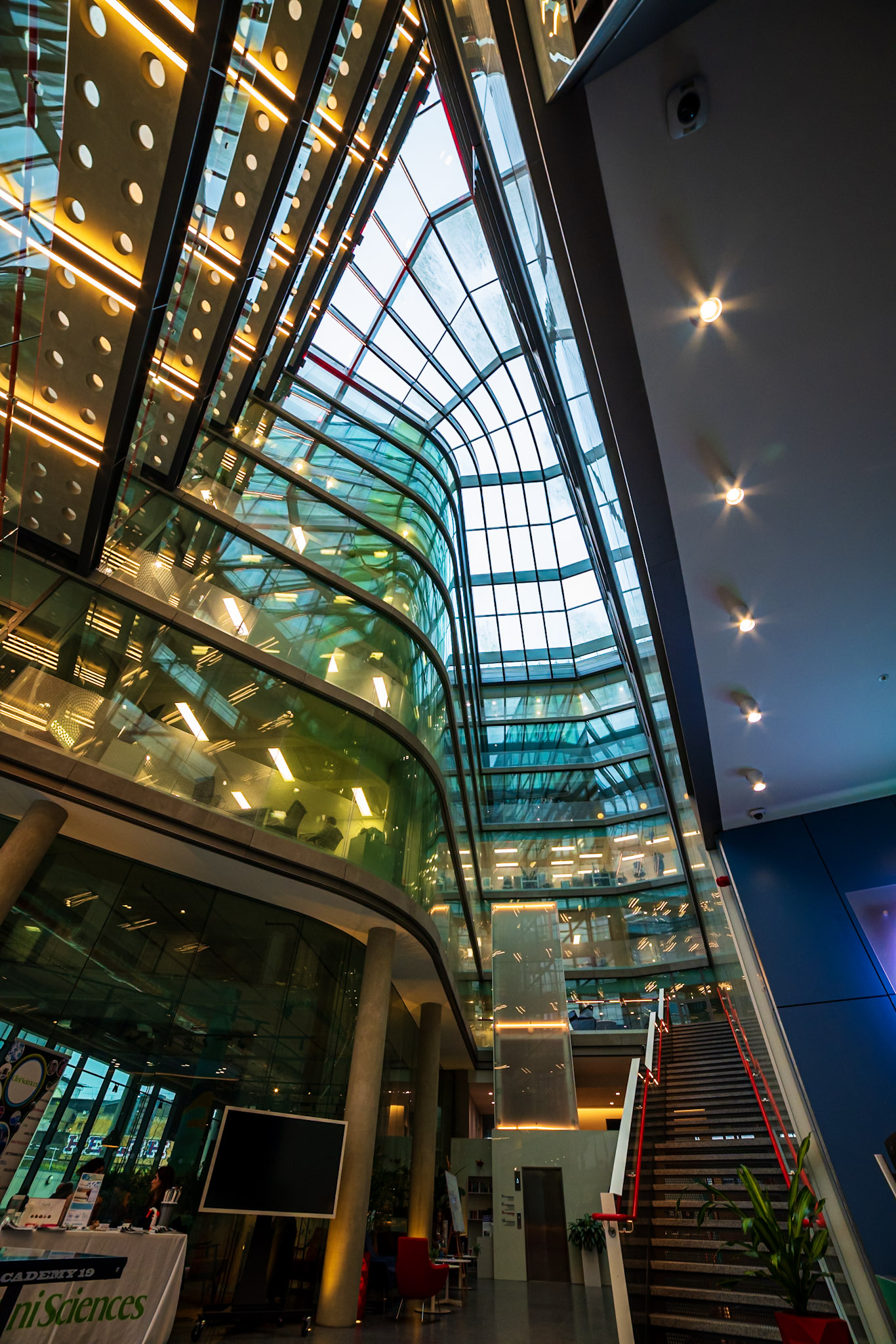 Glass atrium and architectural features of White City Innovation District